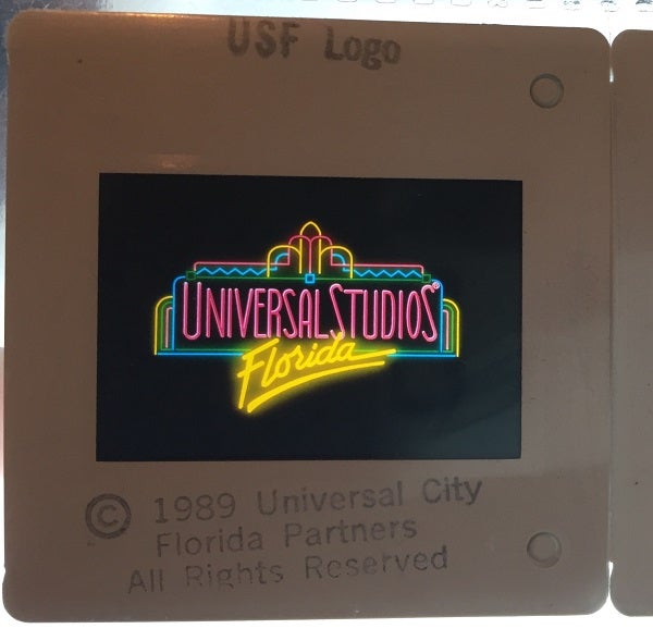 Item #1119 Original 1989 Universal Studios Florida 35mm PRE-OPENING Advertising Slide LOT of EIGHT (8). UNIVERSAL STUDIOS PARTNERS.