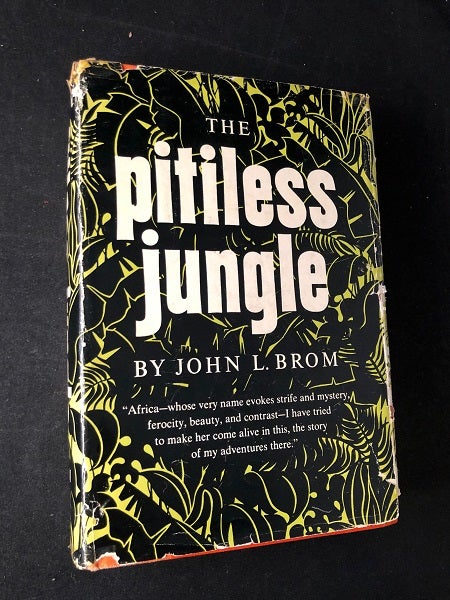 Item #2394 The Pitiless Jungle; "Africa - whose very name evokes strife and mystery, ferocity, beauty, and contrast - I have tried to make her come alive in this, the story of my adventures there." John BROM.