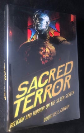 Item #2993 Sacred Terror; Religion and Horror on the Silver Screen. Douglas COWAN