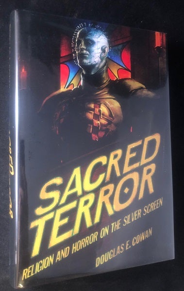 Item #2993 Sacred Terror; Religion and Horror on the Silver Screen. Douglas COWAN.