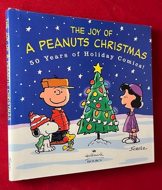 Item #5455 The Joy of A Peanus Christmas: 50 Years of Holiday Comics! Charles SCHULZ, Don HALL